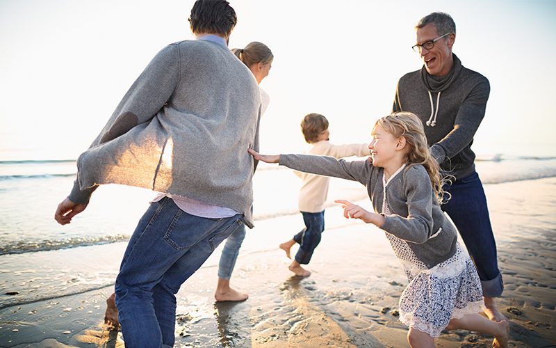 Family having fun at the beach